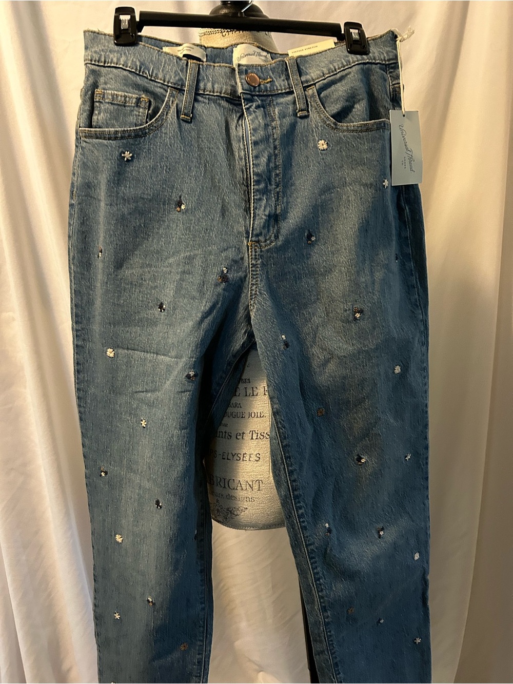 Embellished Blue Denim Jeans with Embroidered Flowers.
